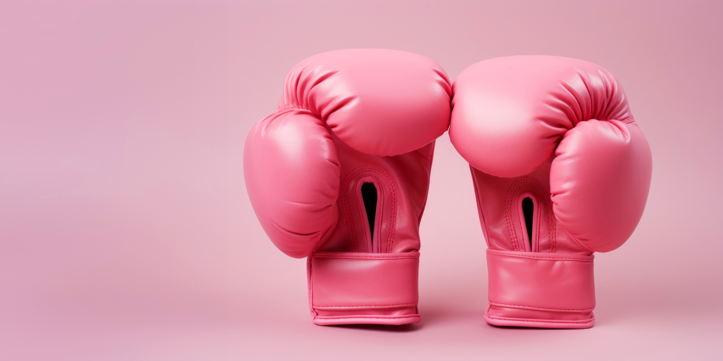 Pair of Pink Boxing Gloves as Symbol for Fight against Breast Cancer